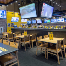 Buffalo Wild Wings LV Strip Location; Bar with 3 screen jumbotron over bar