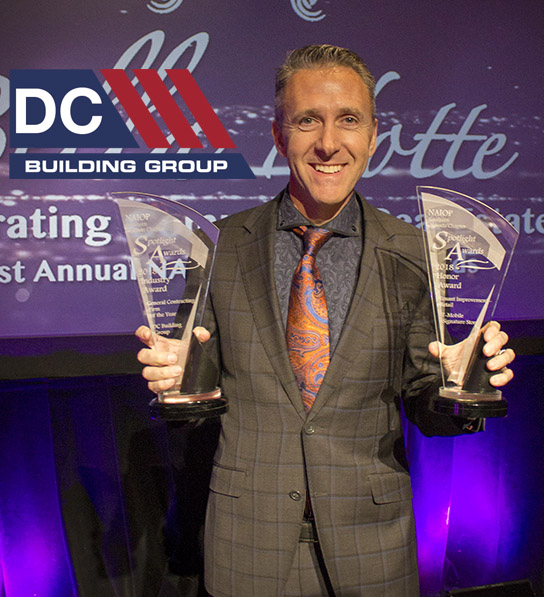 Spotlight Shawn 2 Trophies TM GC_8066 465×510 logo ul Shawn Danoski with 2 NAIOP Spotlight Awards for GC of the Year and T-Mobile Signature Store Project